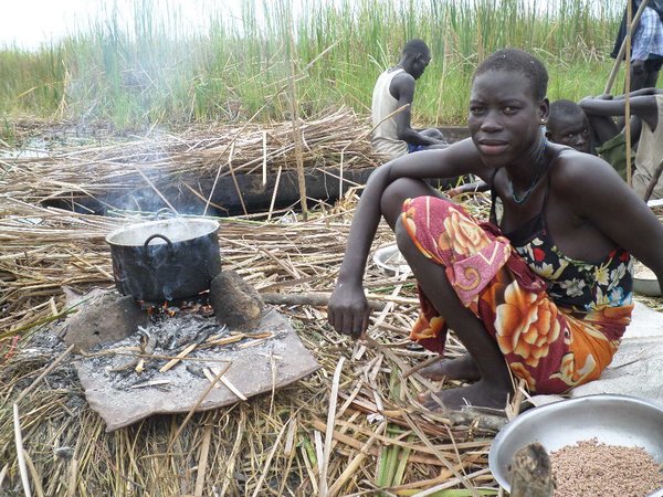 South Sudan, 2016: As fighting ensued in their villages, people fled into the swamps of Southern Unity to find a safe place to hide. They created little islands by flattening the reeds and adding mud. <br />Photo: ©FAO/Francis Muana