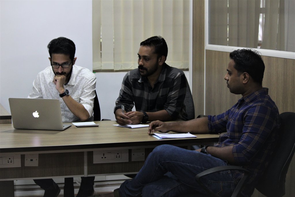 Allen Shaji and Sobin Mathew from Leopard Tech Labs and Sethu G from Wildlife Trust of India (f.l.t.r.) engage in discussions.